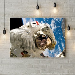 Картина на холсте "Космонавт над землей"
